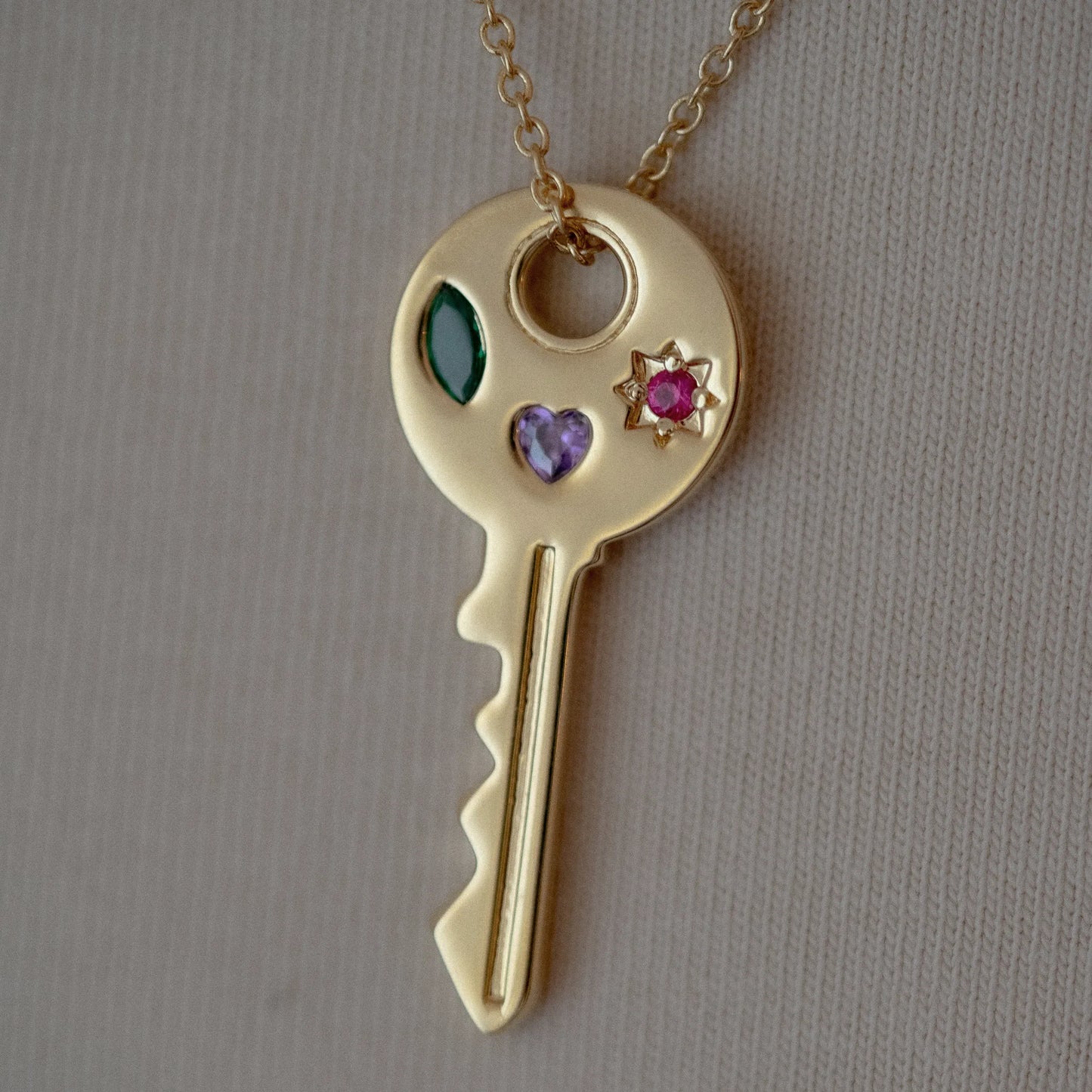 Collier Clé Violet