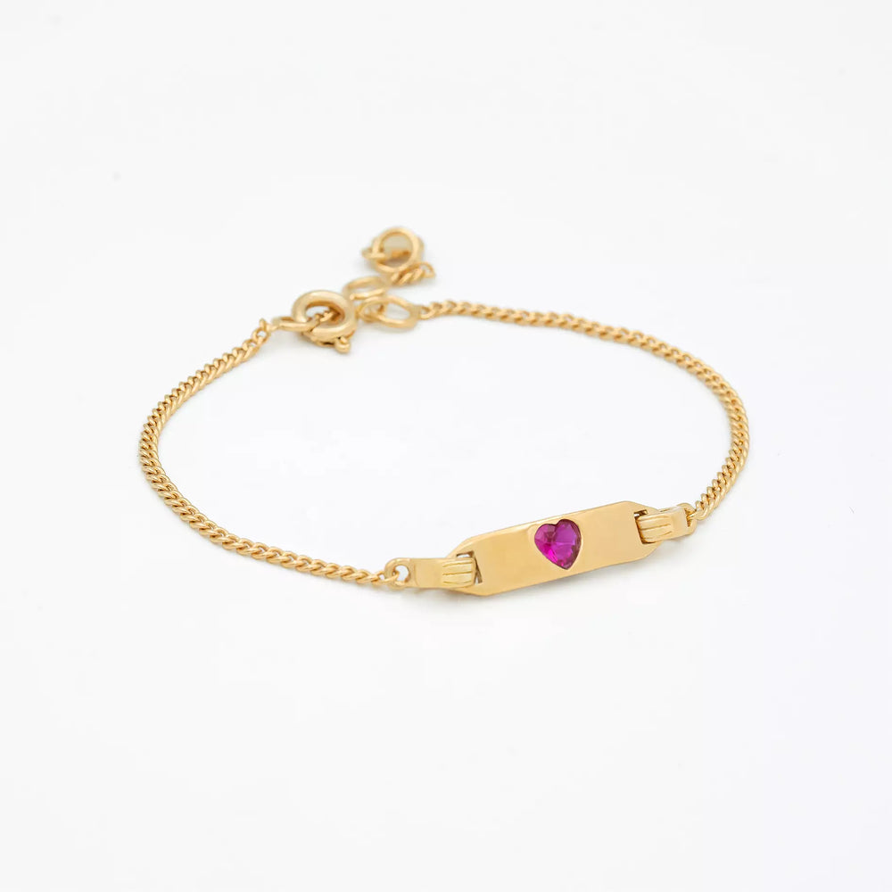 gourmette enfant plaquée or collection l'amoureuse à gravure personnalisable sertie en son centre d'un zircon de couleur fuchsia en forme de coeur